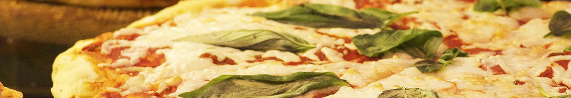 Eating Italian Pizza at Padrino's II Pizza & Sub restaurant in Stafford, VA.